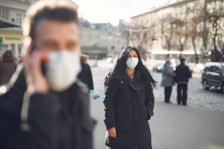 woman wearing a mask